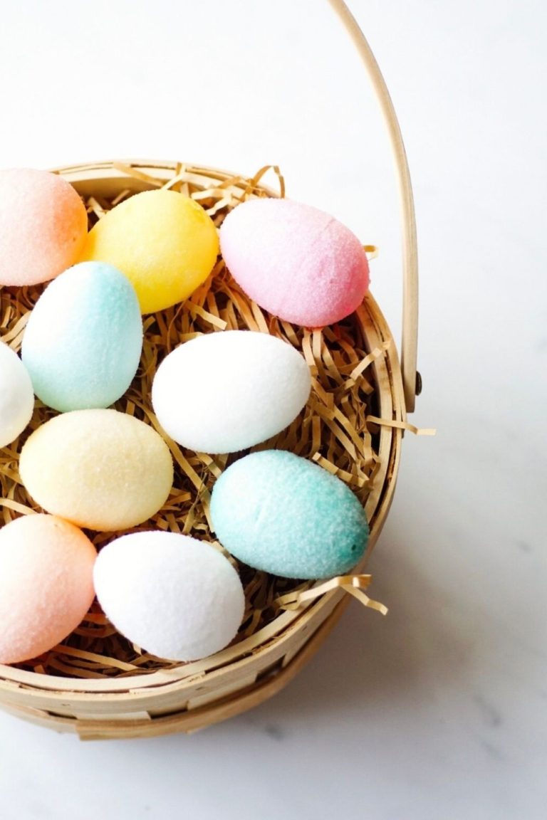 Sugar covered plastic easter eggs in a basket ready to paint