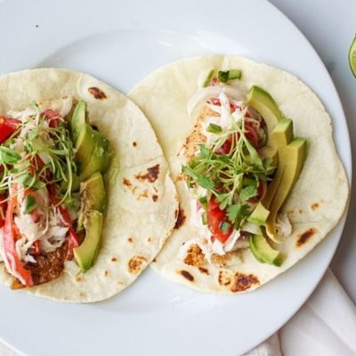 Striped bass fish tacos with bell pepper citrus slaw and grape tomato pico de gallo - gluten free recipe