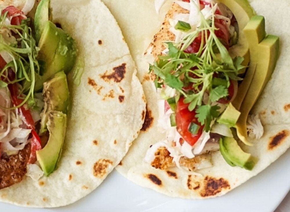 Striped bass fish tacos with bell pepper citrus slaw