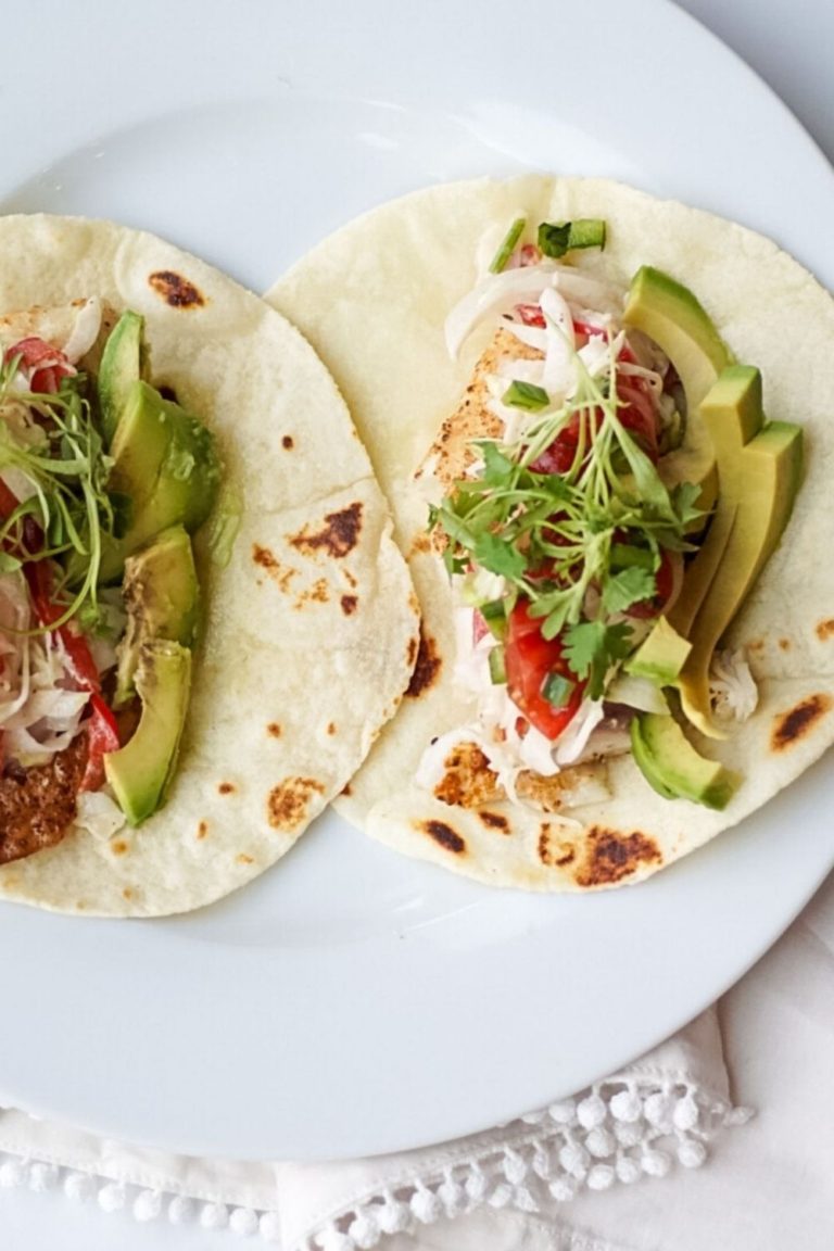 Striped bass fish tacos with bell pepper citrus slaw and grape tomato pico de gallo - gluten free recipe