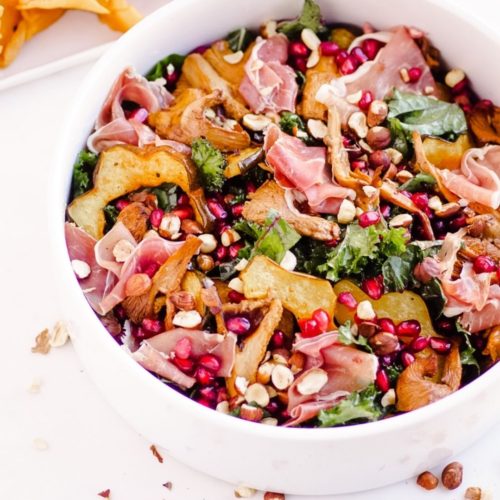 Beautiful Fall Kale Salad with Chanterelle Mushrooms, Acorn Squash, Prosciutto, and Pomegranates | Recipe