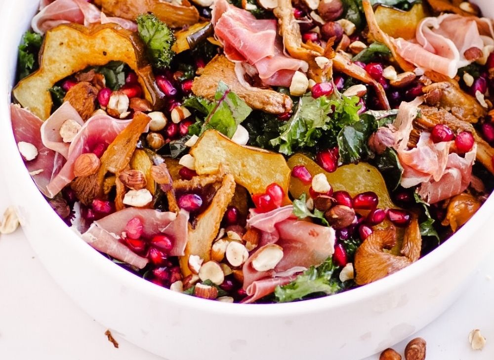 Beautiful Kale Salad with Chanterelle Mushrooms, Acorn Squash, and Prosciutto.