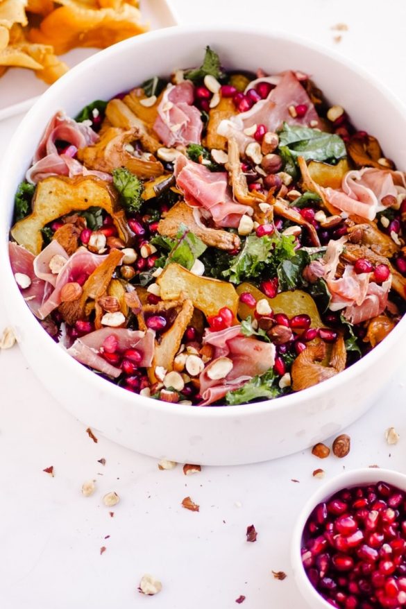 Beautiful Fall Kale Salad with Chanterelle Mushrooms, Acorn Squash, Prosciutto, and Pomegranates | Recipe
