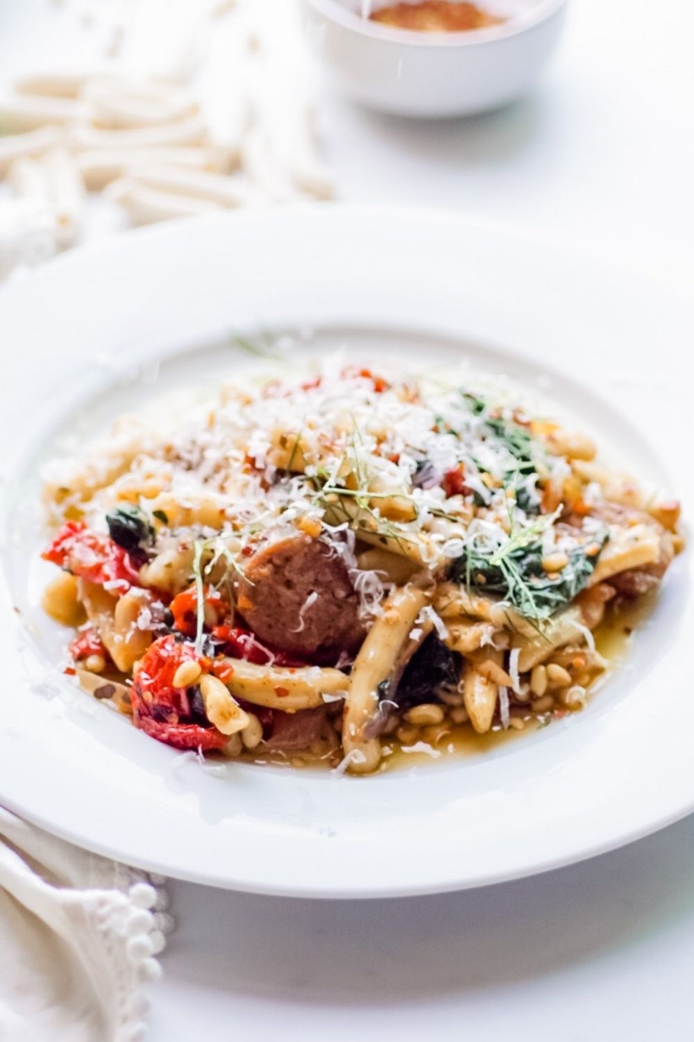 Easy Recipe for Homemade Pasta with Hot Italian sausage, Fennel, Kale, Sun-Dried Tomatoes, and Pine Nuts